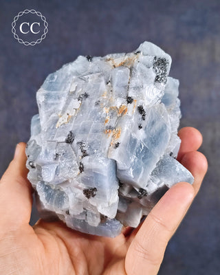 Blue Calcite with Graphite Specimen from Namibia in hand