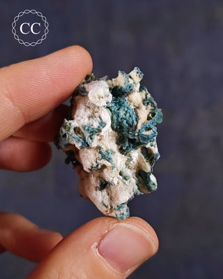 Blue Chalcedony specimen from Aurangabad, India shown in a hand