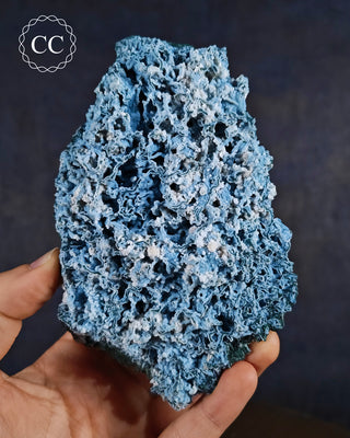 Blue Chalcedony specimen from Aurangabad, India shown in a hand