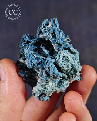 Blue Chalcedony specimen from Aurangabad, India shown in a hand
