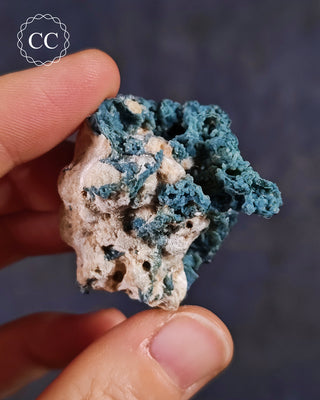 Blue Chalcedony specimen from Aurangabad, India shown in a hand