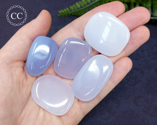 Blue Chalcedony Tumbled Crystals in hand