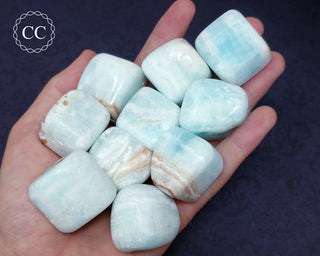 Caribbean Calcite Tumbled Crystals in hand