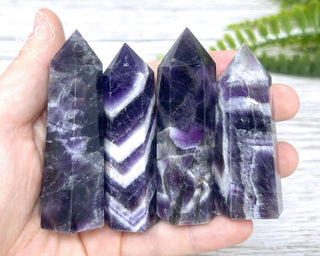 Chevron Amethyst Towers in hand