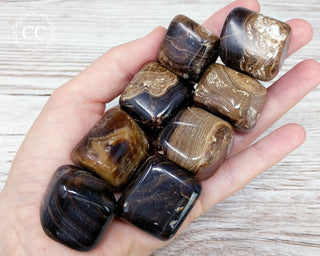 Chocolate Calcite Tumbled Crystals in hand