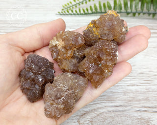 Natural Citrine Clusters from Morocco in hand