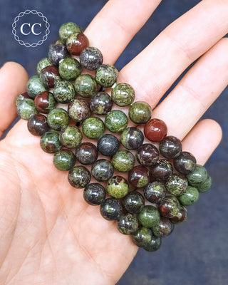 Dragons Blood Jasper 8mm Beaded Bracelets in hand