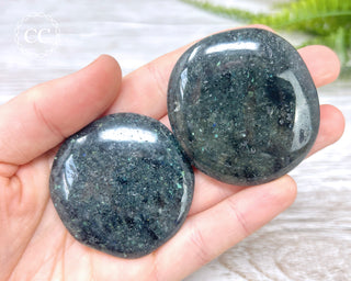 Galaxyite Palm Stones in hand