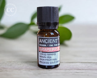 Grapefruit Essential Oil on a table
