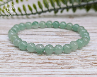 Green Aventurine 6mm Beaded Bracelet on light background