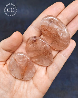 Hematoid Quartz | Fire Quartz Flat Palm Stones in hand

