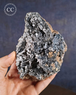 Hematite & Calcite Specimen from Murcia, Spain shown held in hand
