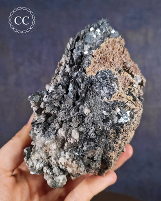 Hematite & Calcite Specimen from Murcia, Spain shown held in hand