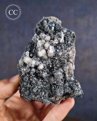 Hematite & Calcite Specimen from Murcia, Spain shown held in hand
