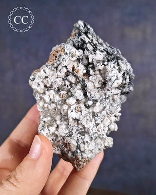 Hematite & Calcite Specimen from Murcia, Spain shown held in hand