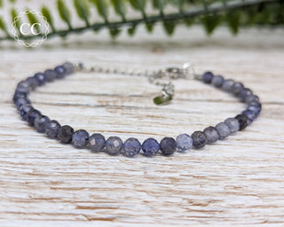 Iolite Faceted Beaded Bracelet on light background