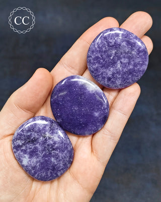 Lepidolite Palm Stones in hand