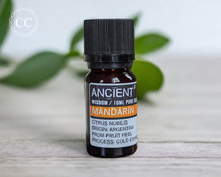 Mandarin Essential Oil on a table