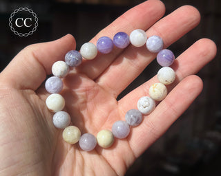 Mexican Morado Opal 10mm Beaded Bracelet on hand