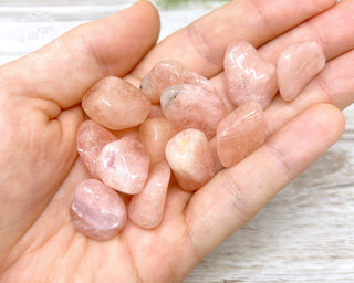 Morganite A Grade Tumbled Crystals in hand