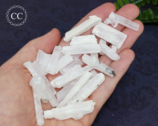 Natrolite Crystals in hand