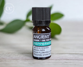 Peppermint Essential Oil on a table