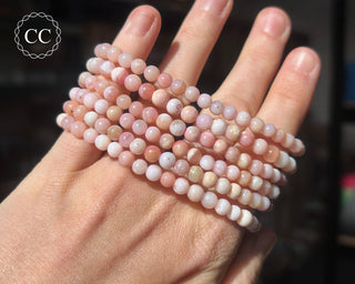 Peruvian Pink Opal Beaded Bracelets on hand
