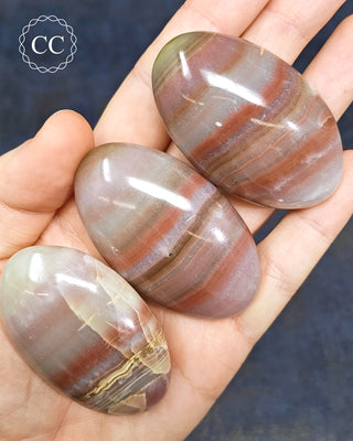 Pink Banded Calcite Palm Stone