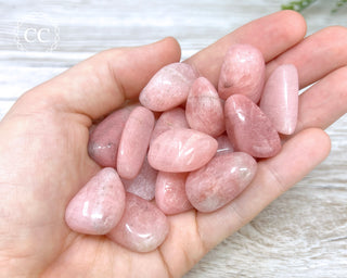 Pink Petalite Tumbled Crystals in hand