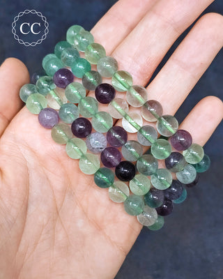 Fluorite 8mm Beaded Bracelets in hand