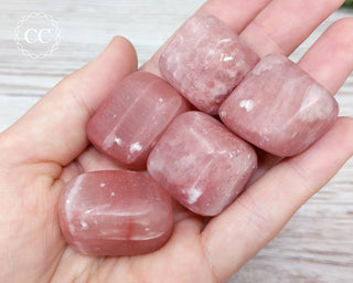 Rose Calcite Tumbled Crystals in hand