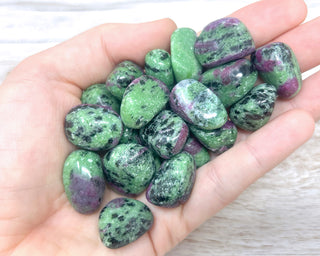 Ruby in Zoisite Tumbled Crystals in hand