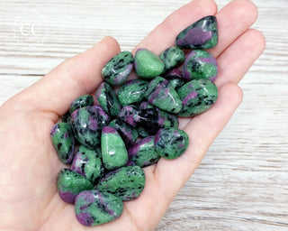 Ruby in Zoisite Tumbled Crystals in hand