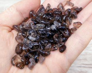 Smoky Quartz Crystal Chips in hand