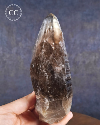 Large Smoky Quartz crystakl in hand