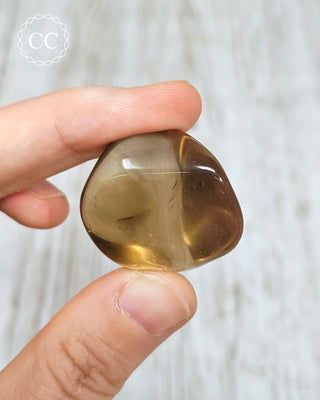 Natural Zambian smoky citrine Polished Crystal in hand