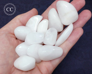 Snow Quartz Tumbled Crystals in hand