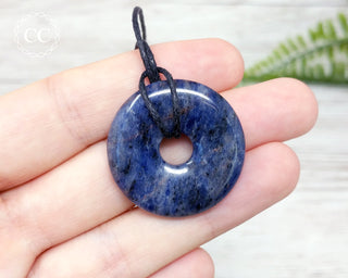 Sodalite Donut Necklace in hand