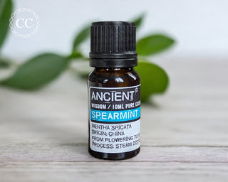 Spearmint Essential Oil on a table