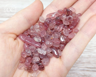 Strawberry Quartz Crystal Chips in hand