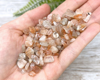 African Sunstone Crystal Chips in hand