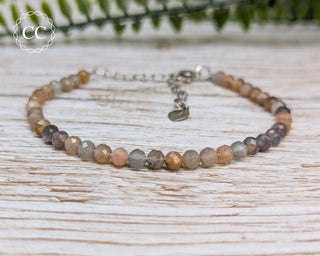 Tanzania Sunstone Faceted Beaded Bracelet on a light background