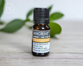 Tangerine Essential Oil on a table