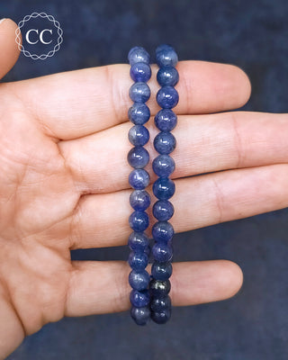 Tanzanite Beaded Bracelets in hand