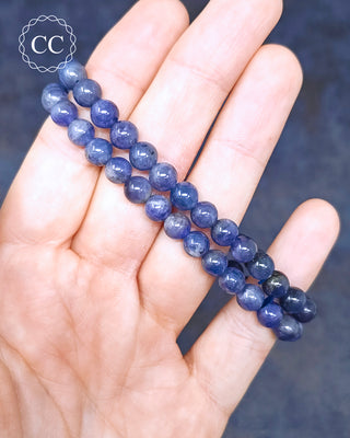 Tanzanite Beaded Bracelets in hand