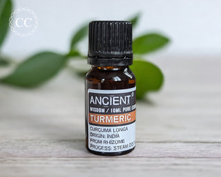 Tumeric Essential Oil on a table