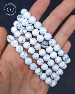 White Howlite 8mm Bracelets in hand
