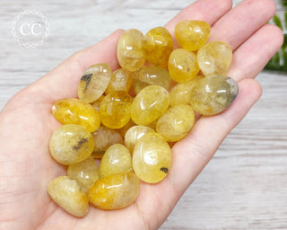 Yellow Blue John Fluorite Tumbled Crystals in hand