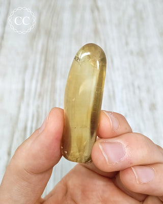 Natural Zambian Citrine Polished Crystal in hand