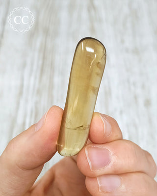 Natural Zambian Citrine Polished Crystal in hand